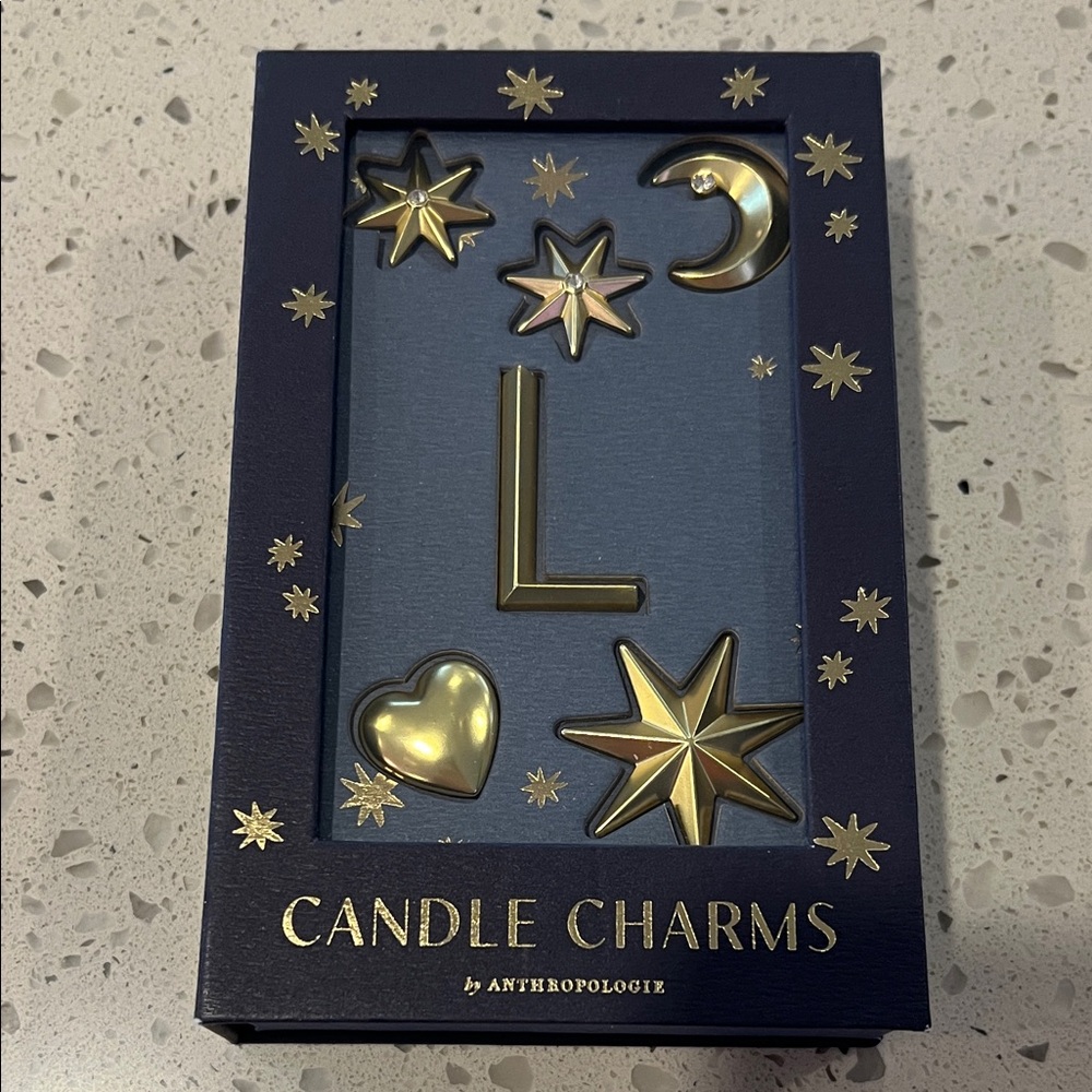 Anthropologie Gold Star and Moon Candle Charms